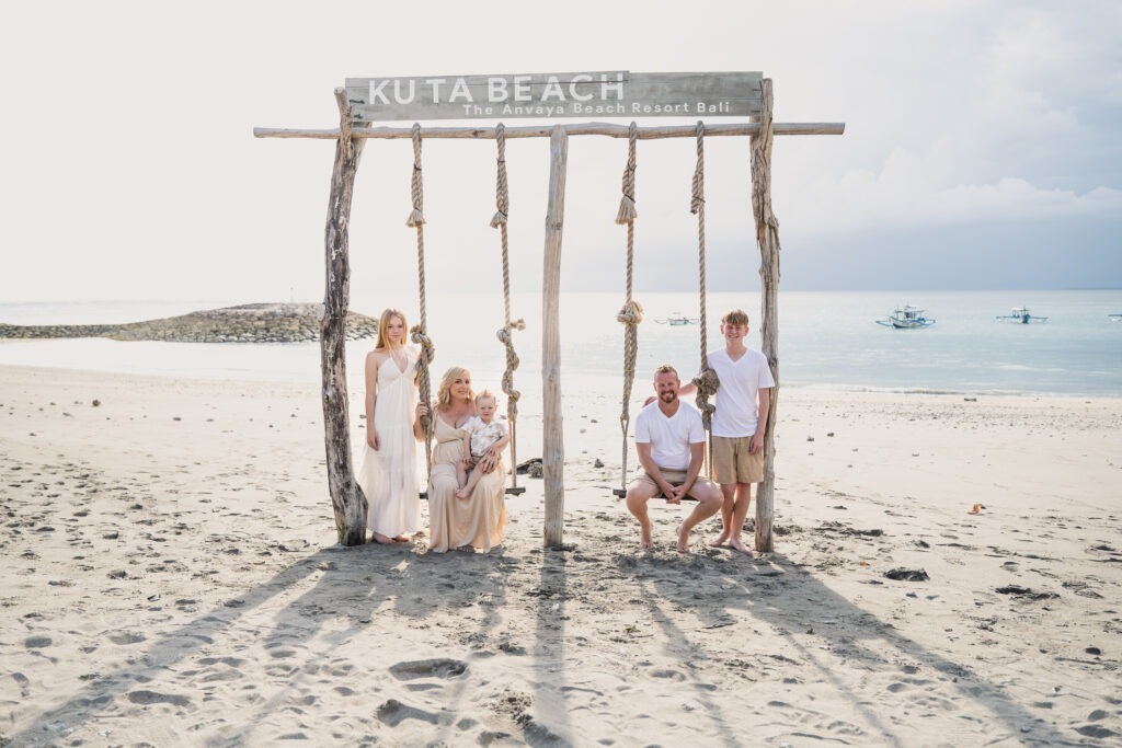 Family photo at Kuta Beach, Bali
